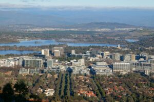 Aerial view of Canberra's central business district with Lake Burley Griffin and Brindabella mountains — Véurr Financial Planning, specialist Canberra financial advisers serving public servants and Defence Force members